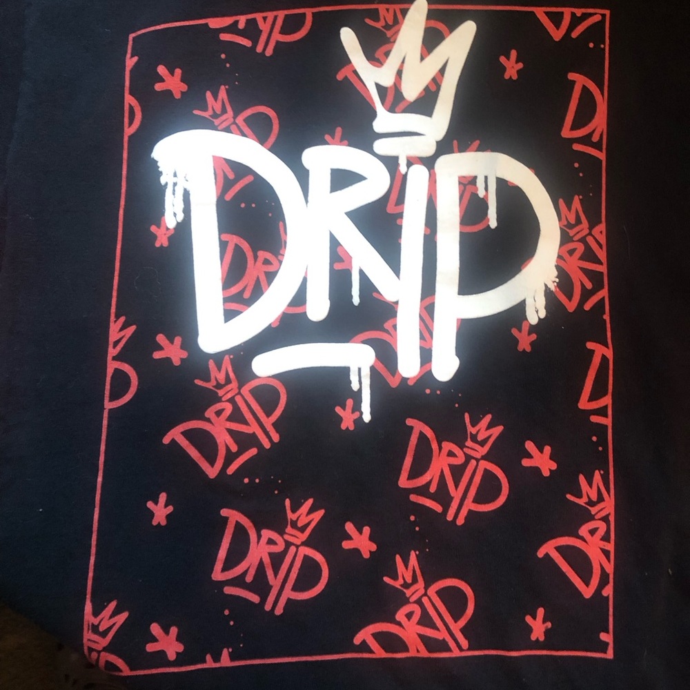 Vibes brand with the print “DRIP” on a black tee shirt.